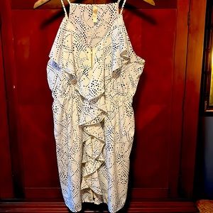 Cream colored dress with black dots all over full zipper top to bottom in front